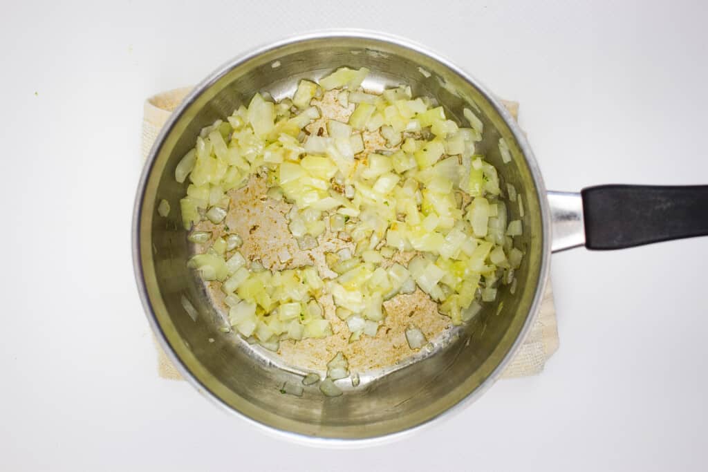 sweat the onions and garlic until cooked