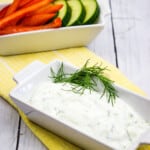 tzatziki sauce keto in a dish with veggies on the side