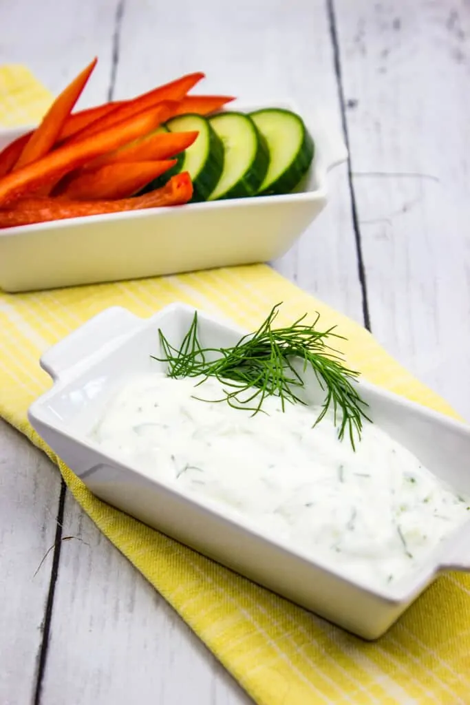 tzatziki sauce keto in a dish with veggies on the side