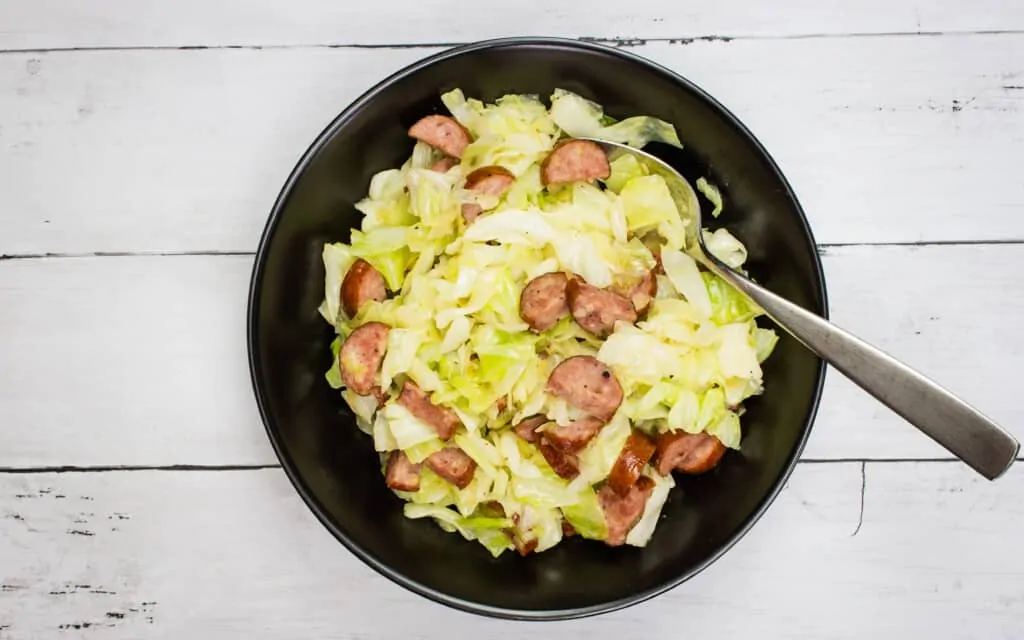 cabbage and sausage in a round bowl