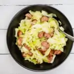 cabbage and sausage in a round bowl