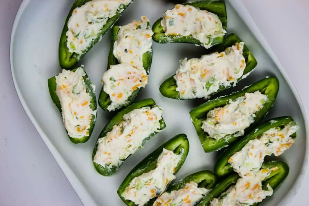 keto jalapeno poppers filled with cream cheese mixture.