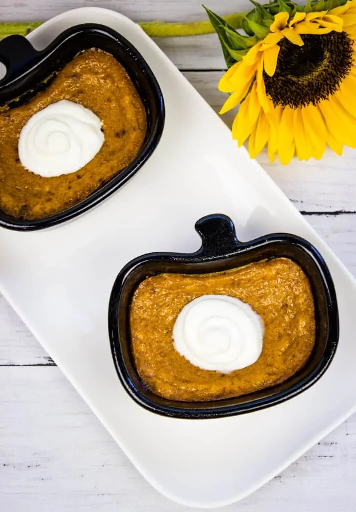 keto pumpkin custard in black ramekins