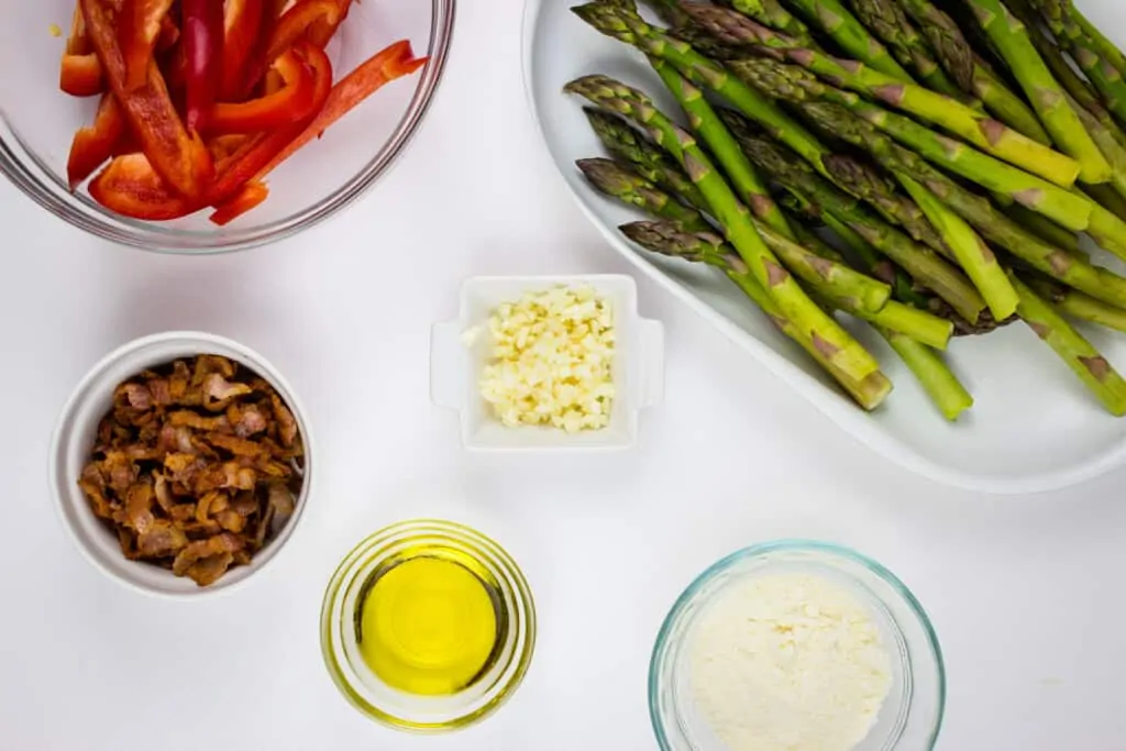 prepped ingredients, asparagus, bacon, bell pepper, garlic, parmesan cheese