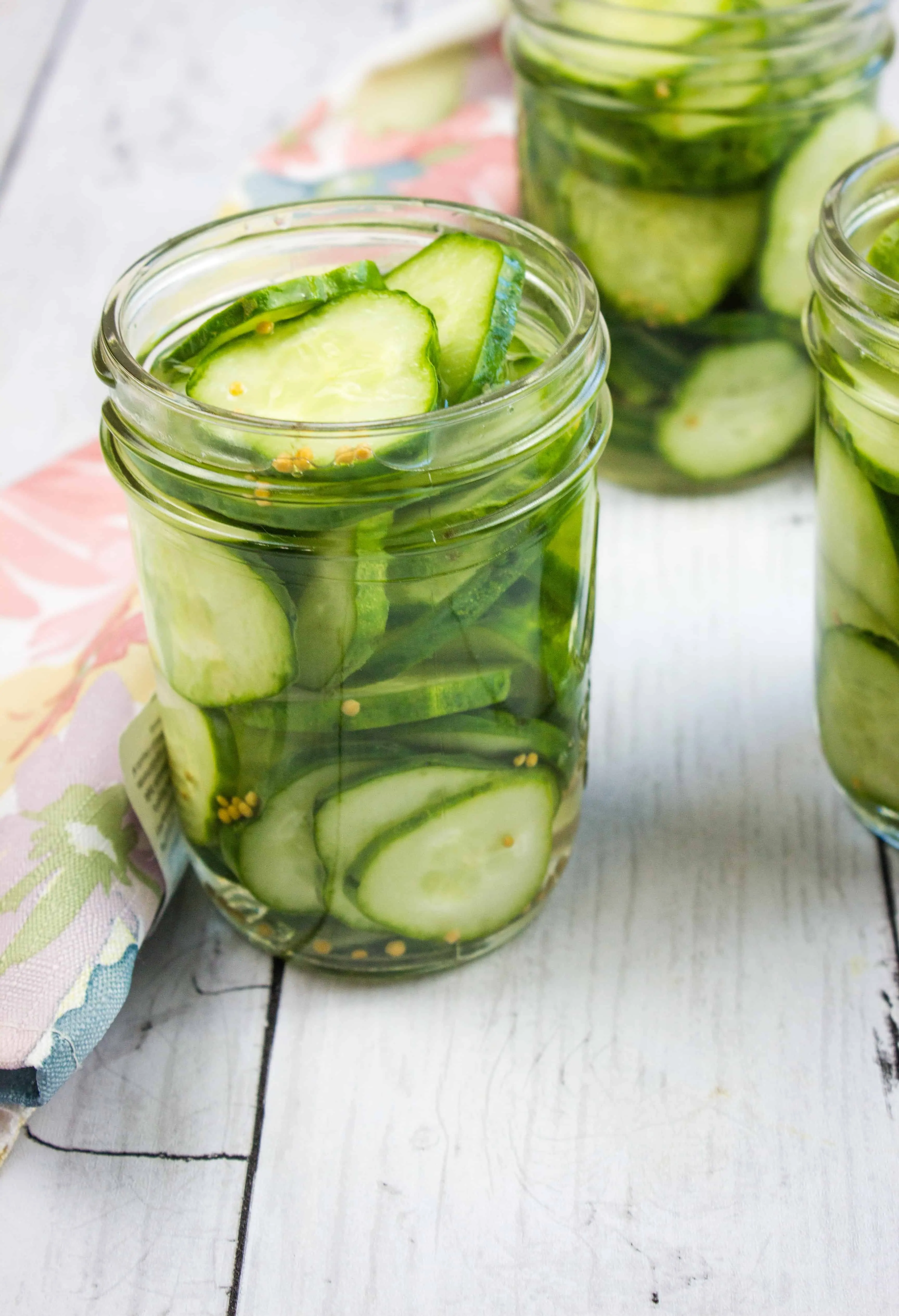 sweet and tangy keto pickles in jars