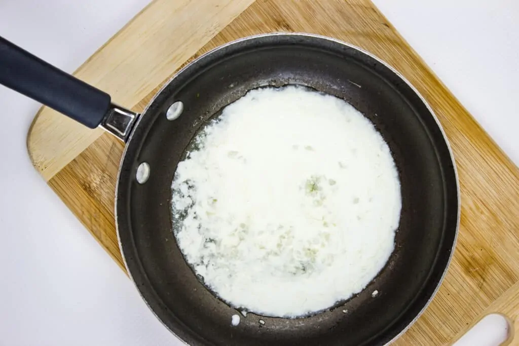 add the cream to the skillet 