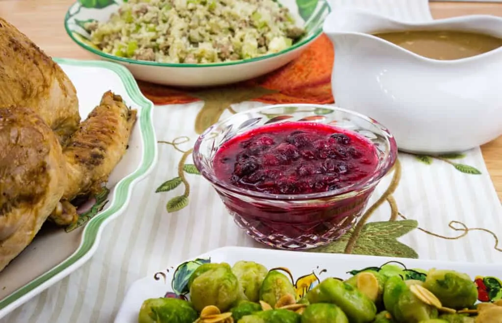 keto cranberry sauce along with other thanksgiving dishes