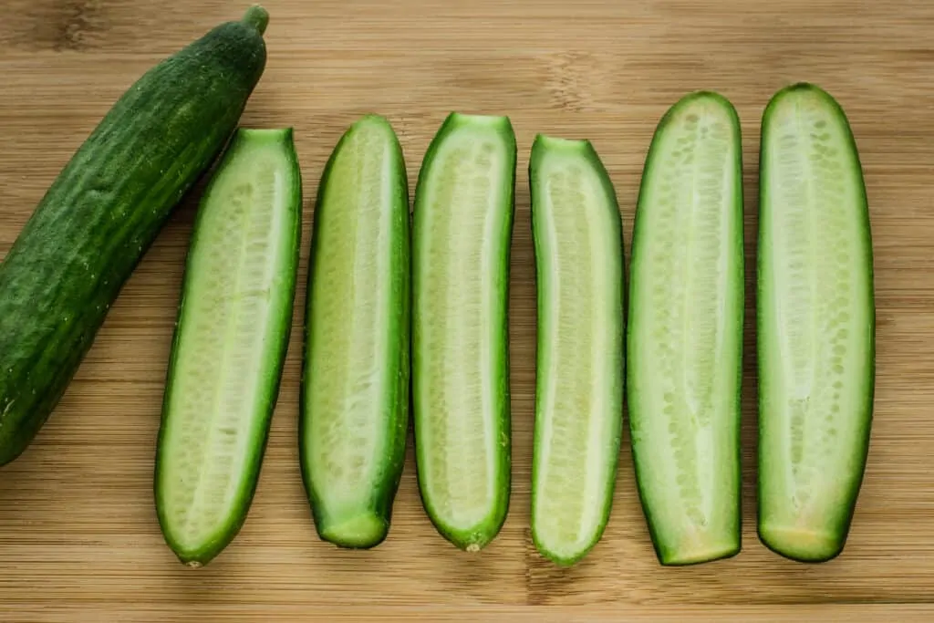 baby cucumbers sliced horizontally to show seeds