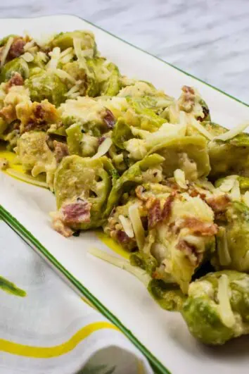 keto brussels sprouts with bacon on a rectangular serving dish
