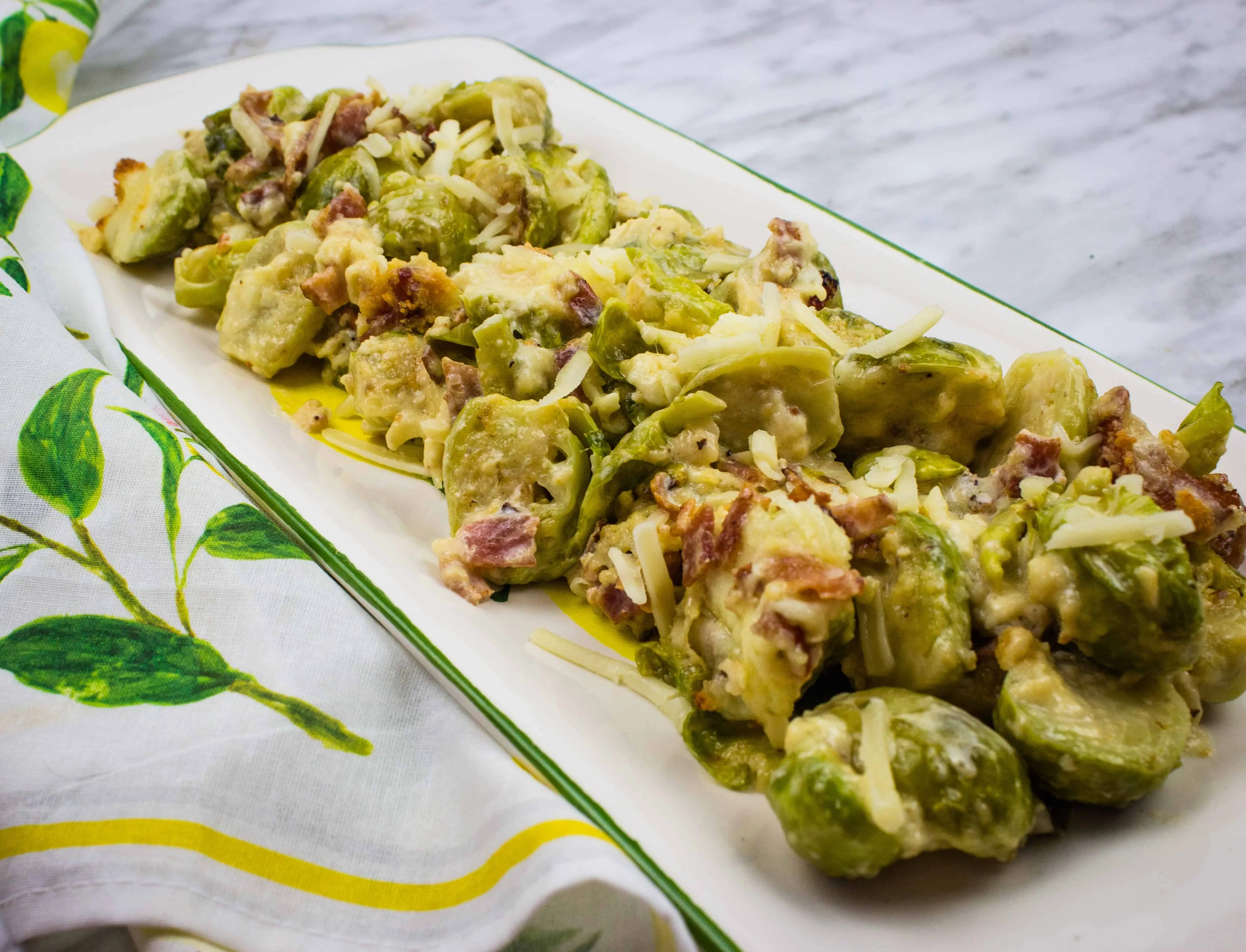 keto brussels sprouts with bacon on a rectangular serving dish