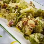 keto parmesan brussels sprouts on a rectangular serving dish