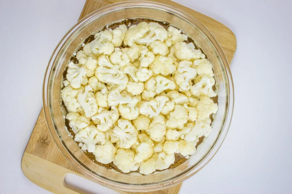 Brining liquid and cauliflower in a bowl