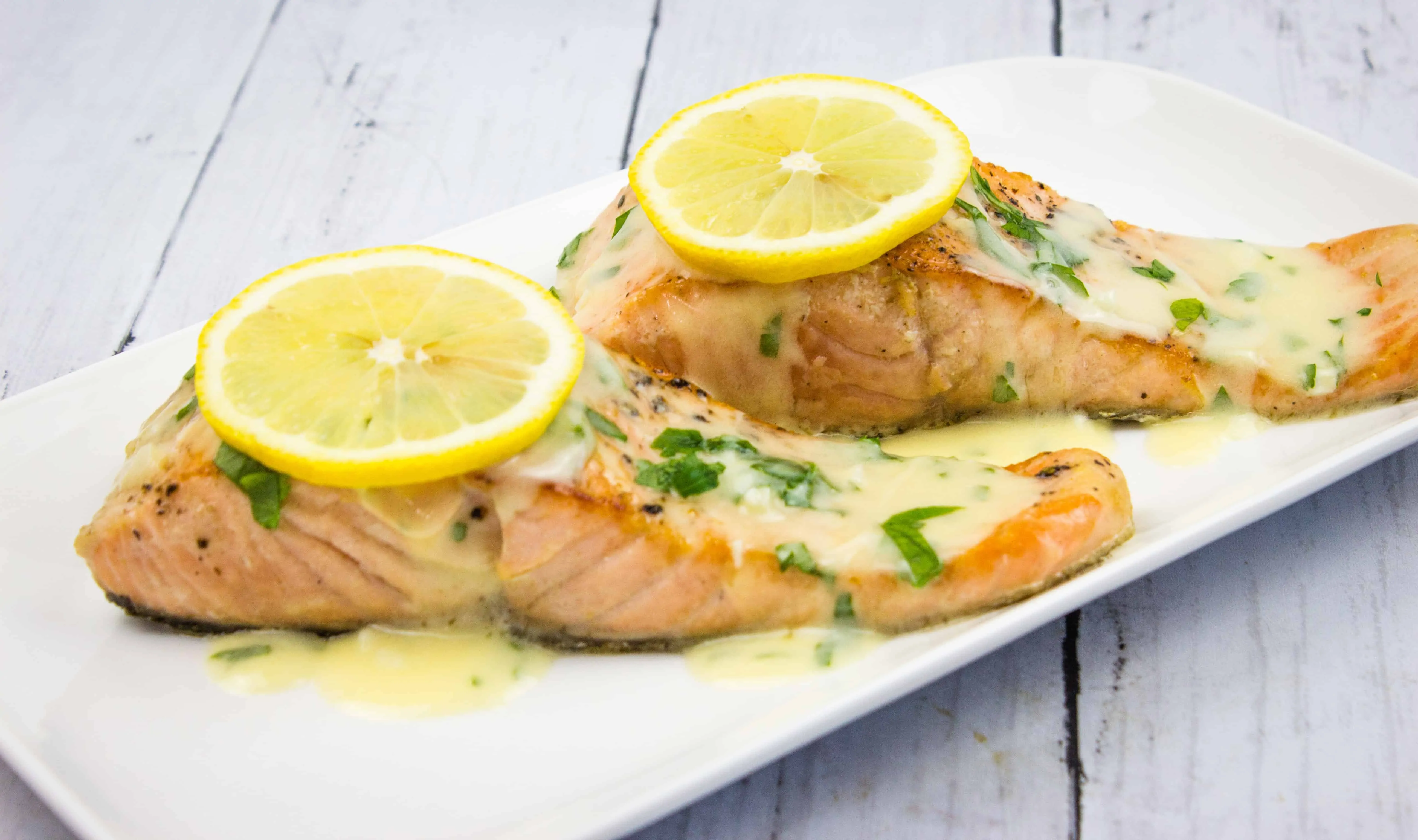 Keto Salmon Lemon Herb Butter Sauce on a serving plate