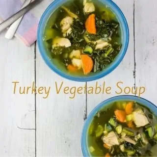 leftover turkey soup in bowls with spoons