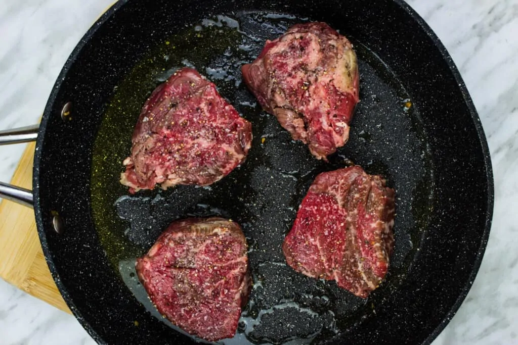 pan sear the tenderloin steaks in oil and butter