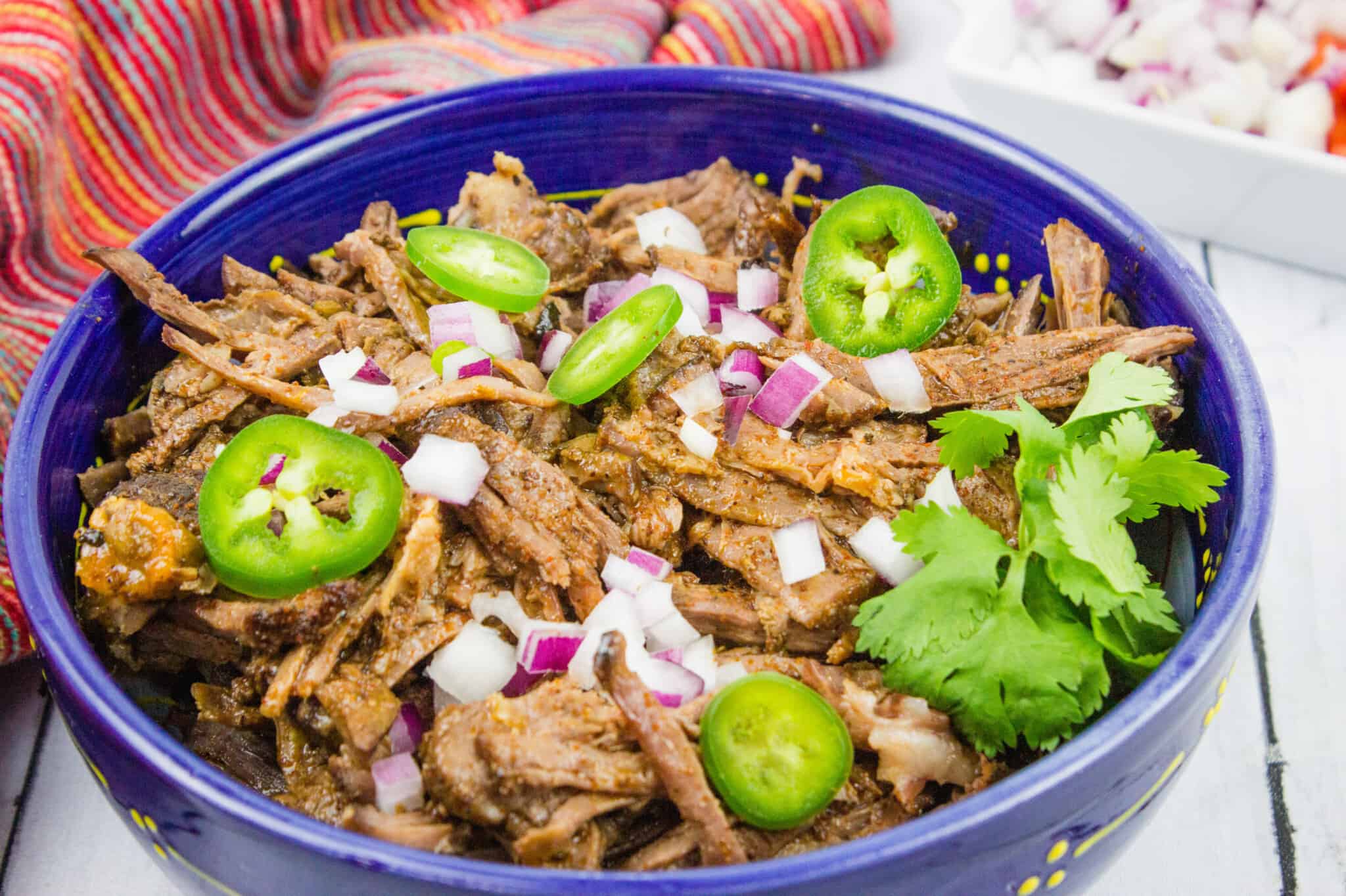 keto beef barbacoa in a serving bowl.
