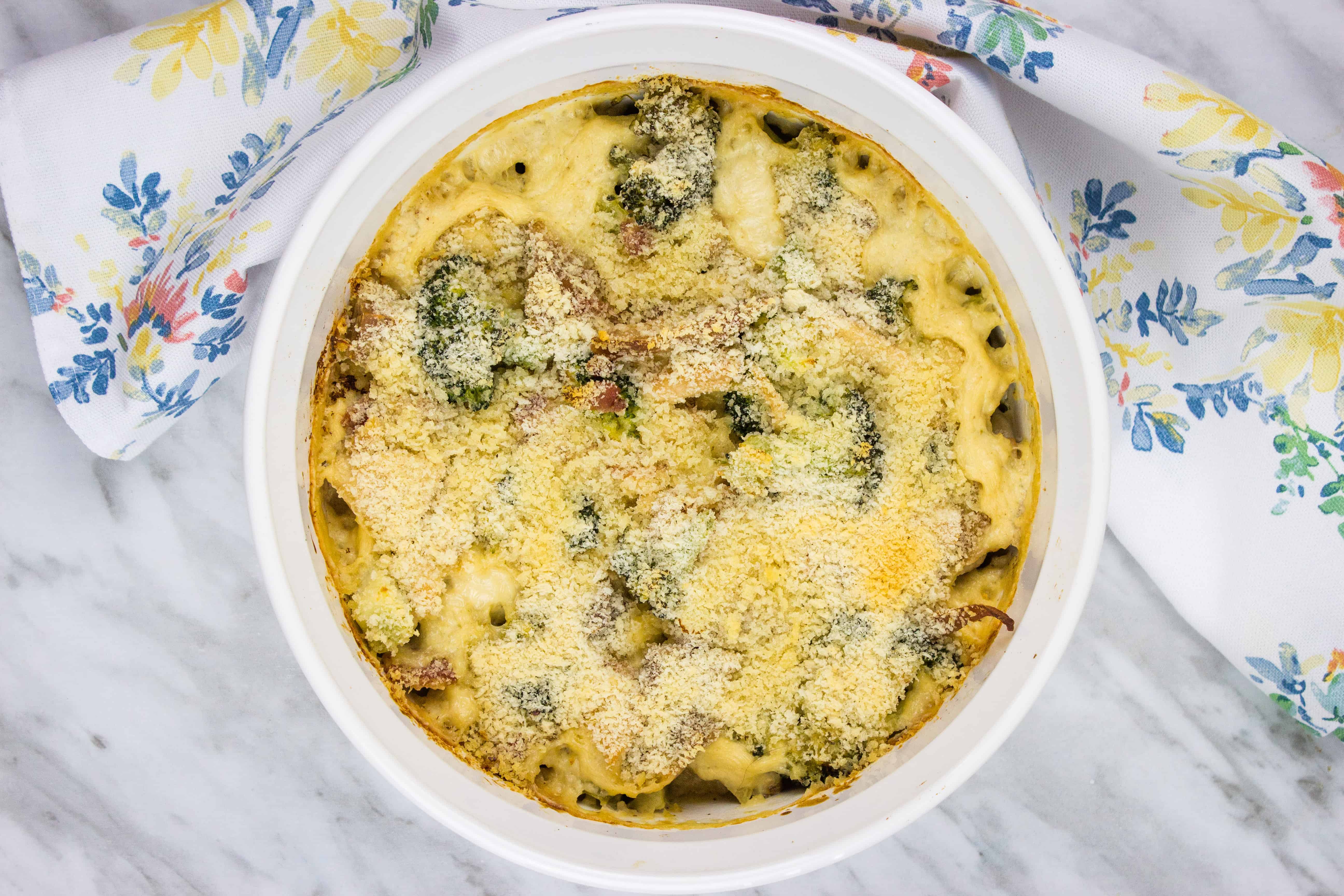 A casserole dish with broccoli and turkey.
