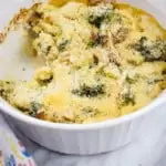 keto keto broccoli casserole with turkey in a casserole dish