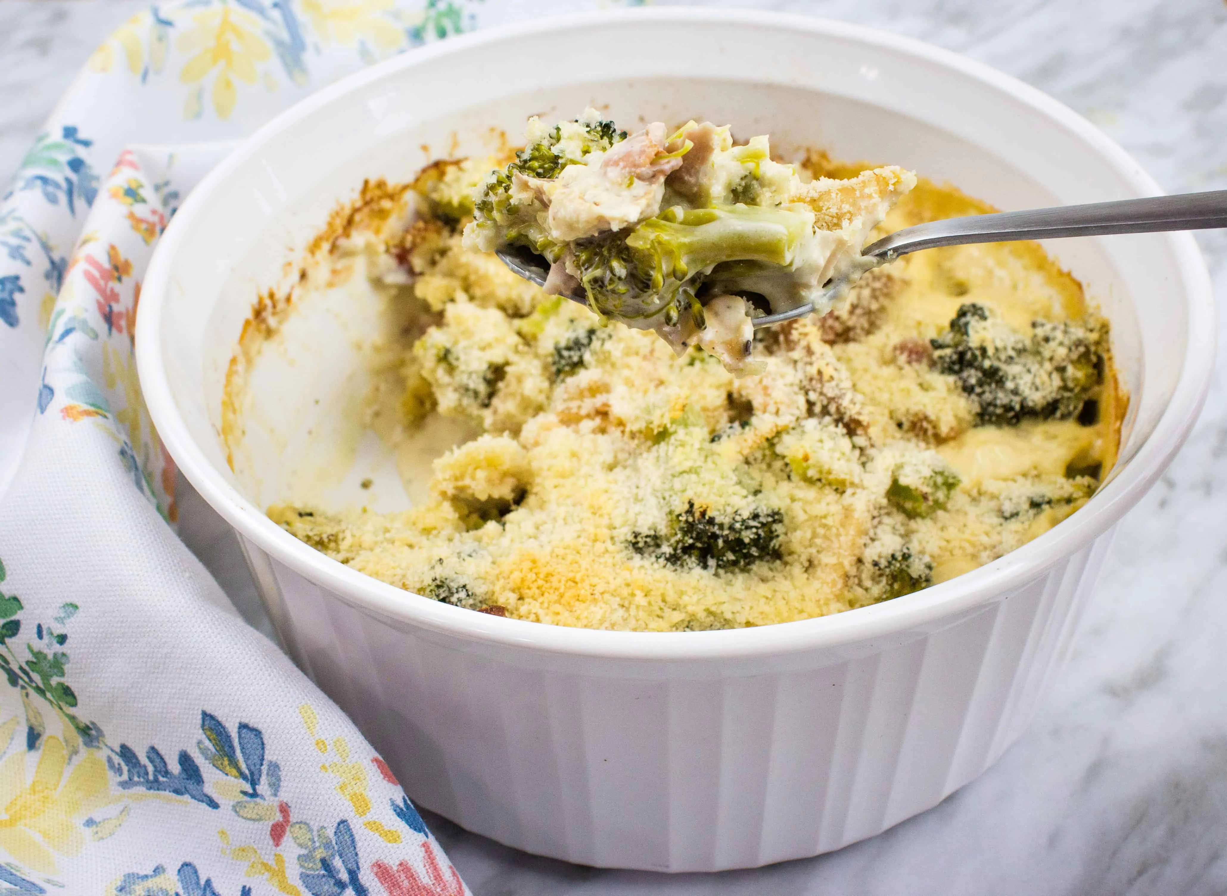 keto turkey broccoli casserole in a white casserole dish