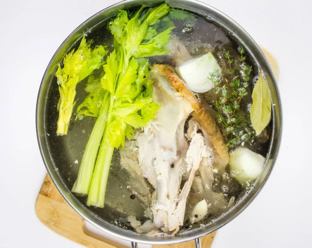turkey stock ingredients in a large pot