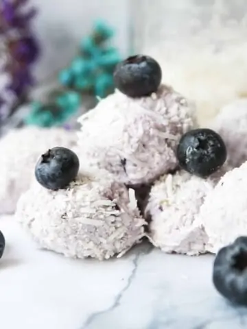 blueberry keto fat bombs on a platter