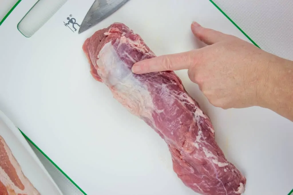 showing the silver skin on pork tenderloin