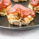 keto meatloaf muffins on a black plate