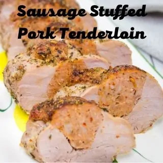 sausage stuffed pork tenderloin slices on a plate