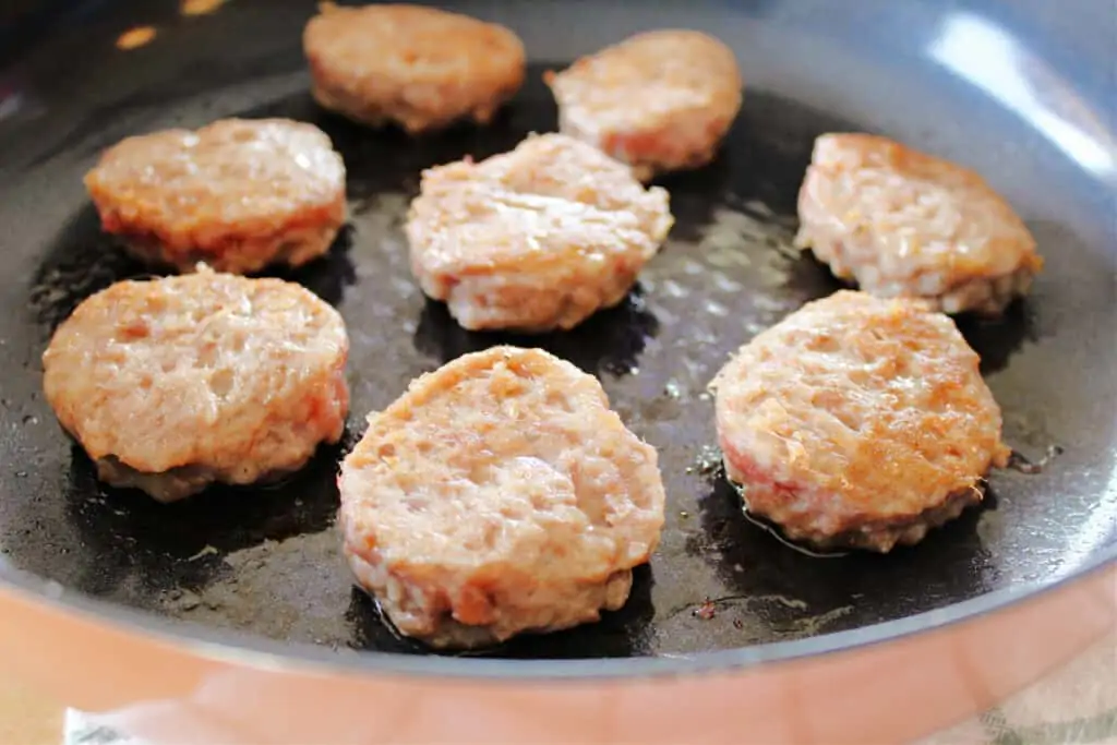 frying the sausage patties