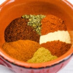 keto chili spice mix in a bowl with the different spices side by side