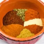 Keto Chili Spice mix in a bowl with the different spices side by side