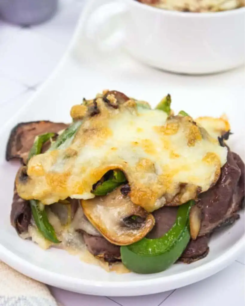 Keto Philly Cheesesteak Stacks on a white plate.