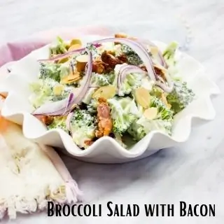 keto broccoli salad with bacon in a white serving dish