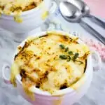 keto french onion soup topped with a cheesy layer