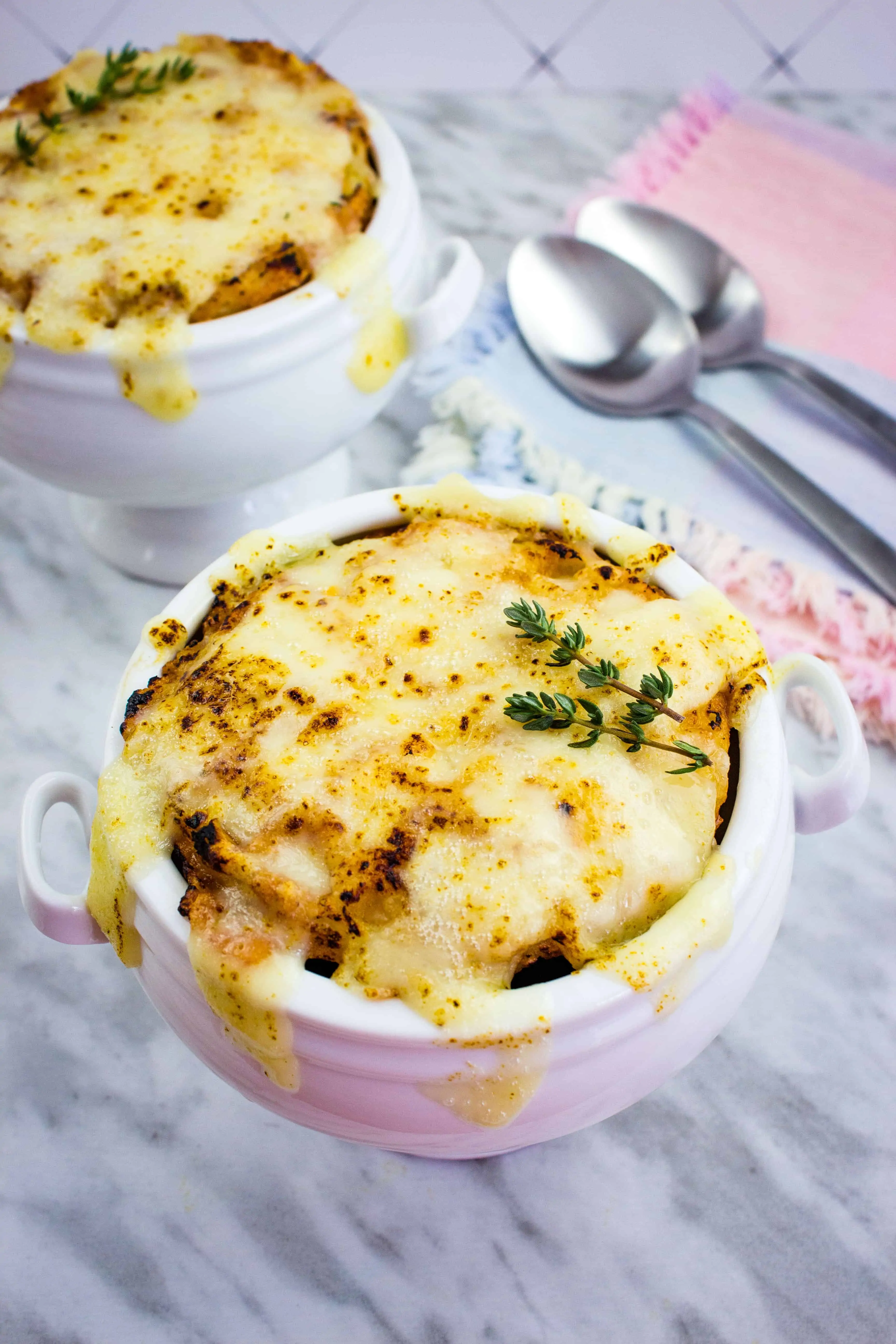 keto french onion soup topped with a cheesy layer