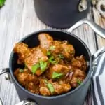 hungarian keto goulash in individual black casserole dishes