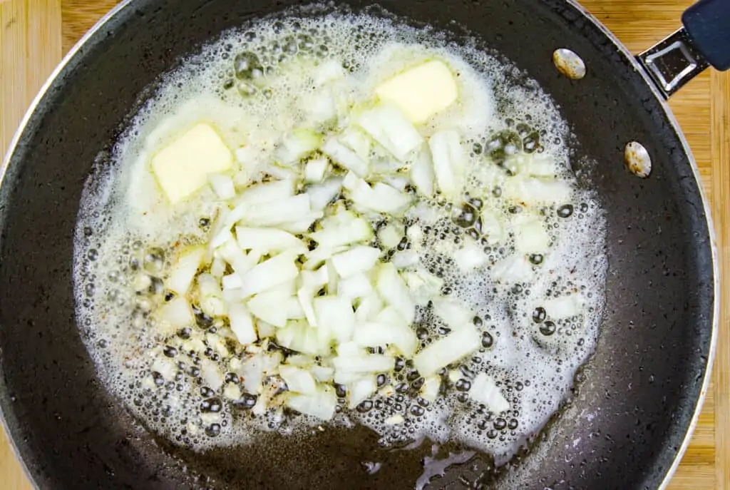 onions and garlic in a skillet with butter 