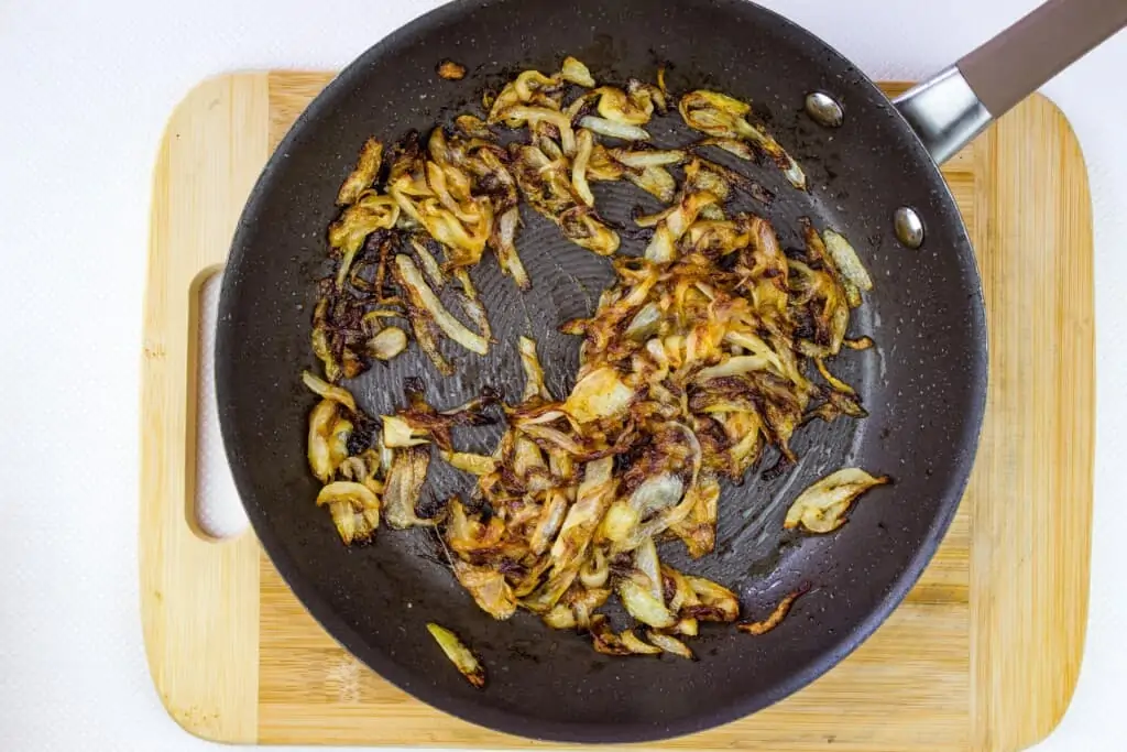 caramelized onions in a black skillet