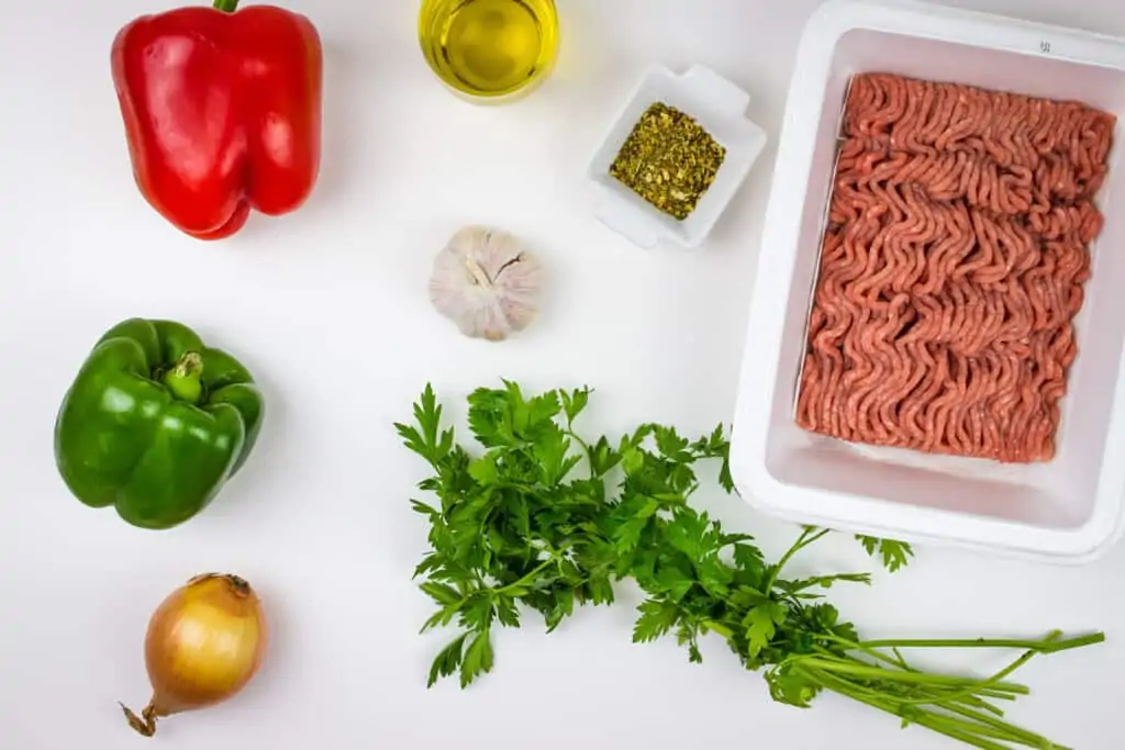 Ingredients to make Italian ground turkey and peppers.