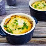 keto meatloaf casserole in a small blue baking dish with a second serving in the background