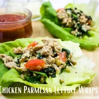Italian chicken parmesan lettuce cups with sauce in the background