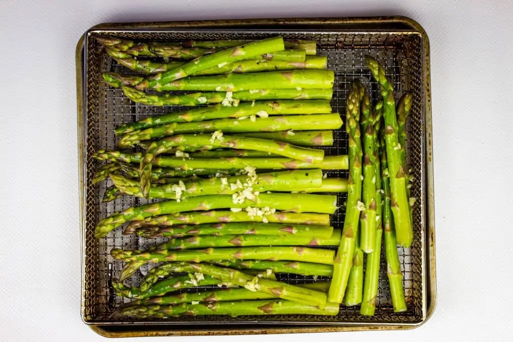 Arrange in the air fryer and cook until tender crisp.