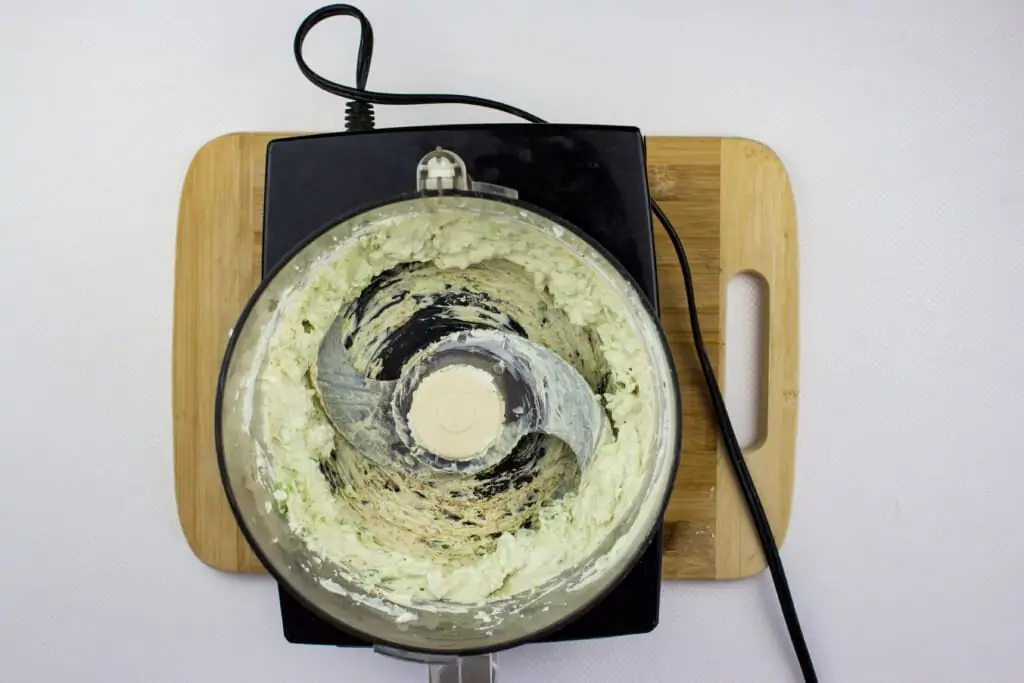 the jalapeno and cream cheese in a food processor