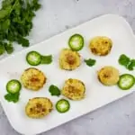 keto stuffed mushrooms on a white platter