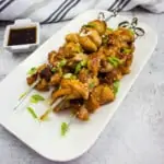 keto chicken teriyaki skewers on a white plate