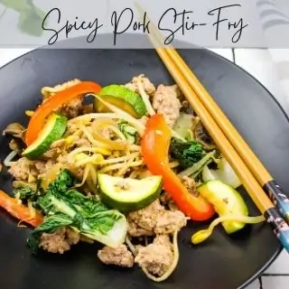 spicy pork and vegetable stir fry on a plate