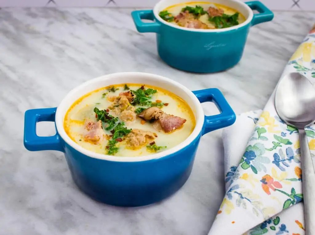 keto zuppa toscana soup in two blue bowls