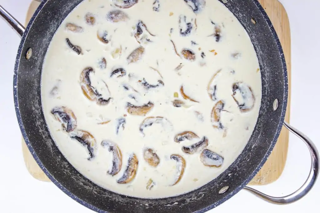 the keto chicken marsala sauce in a skillet.