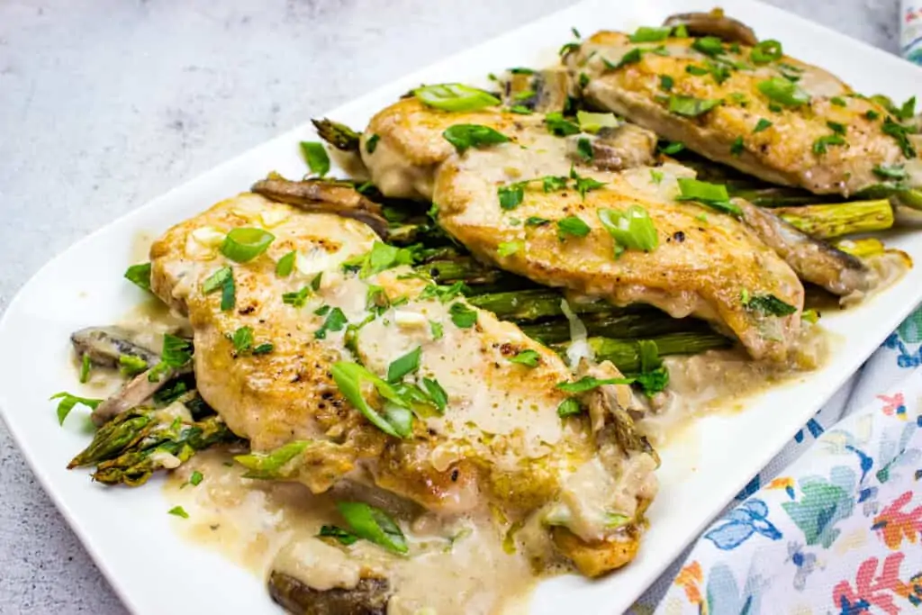 creamy keto chicken marsala on a white platter