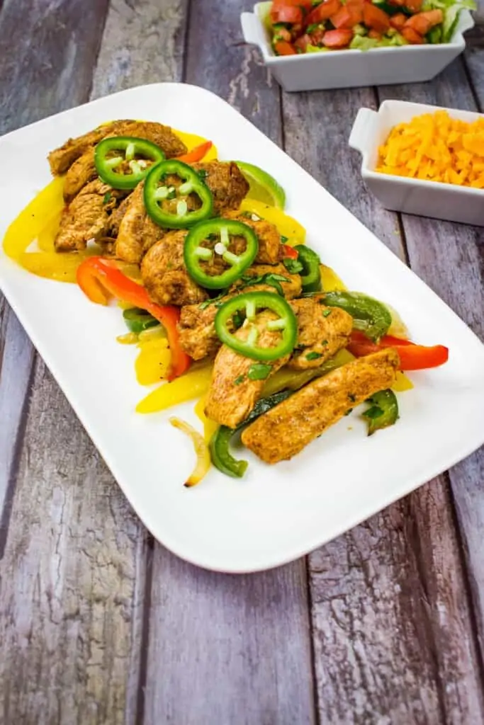 keto fajita skillet on a white platter